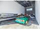 Spacious garage with multiple vehicles, showcasing its ample space for car enthusiasts or storage needs at 6500 Motor Enclave Way # 513, Tampa, FL 33610