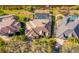 Aerial view of a home with a screened-in pool and lush landscaping at 7226 Bryce N Pt, Pinellas Park, FL 33782