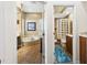 Beautiful bathroom with double doors, a soaking tub, and a tiled glass block shower at 7226 Bryce N Pt, Pinellas Park, FL 33782