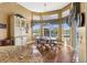 Lovely breakfast nook with lots of natural light, wood floors and view of the water at 7226 Bryce N Pt, Pinellas Park, FL 33782