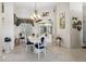 Charming dining area with a chandelier, stylish furniture, and natural light at 7226 Bryce N Pt, Pinellas Park, FL 33782
