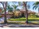 Beautiful single-story home featuring lush landscaping, a well-manicured lawn, and a charming front entrance at 7226 Bryce N Pt, Pinellas Park, FL 33782