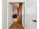 Office with hardwood floors and wooden built in cabinets seen through double doors at 7226 Bryce N Pt, Pinellas Park, FL 33782