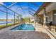 Screened in pool and patio area overlooking the lake at 7226 Bryce N Pt, Pinellas Park, FL 33782