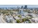 Fantastic aerial view showcases the area's mix of residential and commercial properties, complemented by green spaces and water access at 841 4Th N Ave # 57, St Petersburg, FL 33701