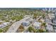 Wide aerial perspective of the property reveals its charming neighborhood setting, surrounded by mature trees and the downtown area at 841 4Th N Ave # 57, St Petersburg, FL 33701