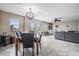 Open concept living and dining area with tile floors, neutral walls, and large windows at 841 4Th N Ave # 57, St Petersburg, FL 33701