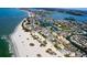 Stunning aerial shot showcasing the coastline, beaches, and residential areas, providing a captivating overview of the location at 8567 W Gulf Blvd # 17N, Treasure Island, FL 33706