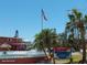 Sunset Cove condominiums offers a delightful exterior with palm trees and beautiful views at 8567 W Gulf Blvd # 17N, Treasure Island, FL 33706