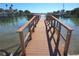 Picturesque pier extending into the bay, offering a tranquil spot for leisurely walks and enjoying waterfront views at 8567 W Gulf Blvd # 17N, Treasure Island, FL 33706