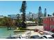 Beautiful waterfront features condos, a dock, and a sandy beach area at 8567 W Gulf Blvd # 17N, Treasure Island, FL 33706