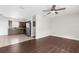 Open-concept kitchen and living area with stainless steel appliances and modern finishes at 9307 N 27Th St, Tampa, FL 33612