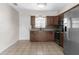 Kitchen features modern stainless steel appliances and plenty of counter space at 9307 N 27Th St, Tampa, FL 33612