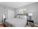 Calm bedroom featuring a closet, natural light, and simple decor at 1003 39Th Ne Ave, St Petersburg, FL 33703