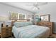 Comfortable bedroom with wooden furniture and plenty of natural light at 1003 39Th Ne Ave, St Petersburg, FL 33703