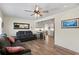 Inviting living room showcasing hardwood floors, stylish furnishings, and an open view to the kitchen at 1003 39Th Ne Ave, St Petersburg, FL 33703