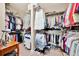 Walk-in closet with organized clothing racks, shelves, and storage space at 10213 Saint Francis Ter, Palmetto, FL 34221