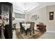 Formal dining room featuring a chandelier, ample seating, and elegant decor at 10213 Saint Francis Ter, Palmetto, FL 34221