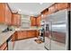 Well-equipped kitchen boasting stainless steel appliances and ample counter space at 10213 Saint Francis Ter, Palmetto, FL 34221