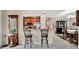 Bright, open kitchen view to living area with stainless appliances and granite counter tops at 10213 Saint Francis Ter, Palmetto, FL 34221