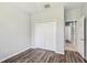 Bedroom featuring hardwood floors, a closet, a ceiling fan and fresh paint at 10810 Moss Island Dr, Riverview, FL 33569