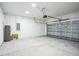 Spacious garage offering ample room for vehicle parking and storage solutions at 122 Jennifer Dr, Rotonda West, FL 33947