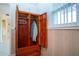The interior of this cedar closet has a hanging rod with a few articles of clothing at 1730 W Del Webb Blvd, Sun City Center, FL 33573