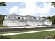 Charming townhome with attached garages and well-maintained landscaping at 17420 Moonflower Dr # 103, Venice, FL 34293