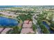 Beautiful community aerial view showcasing lush landscaping and tranquil lakes near well-maintained homes at 178 Shell Falls Dr, Apollo Beach, FL 33572