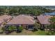 A charming backyard features a screened lanai perfect for outdoor relaxation and entertainment at 178 Shell Falls Dr, Apollo Beach, FL 33572