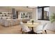 Bright kitchen with stainless steel appliances, a kitchen island with barstool seating and an open concept layout at 1874 Stevenson Ave, Clearwater, FL 33755