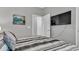 Comfortable bedroom featuring a TV, neutral walls, and calming decor at 19437 Ship Wheel Way, Land O Lakes, FL 34638