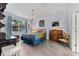 Charming bedroom with a colorful bedspread, bright window and decorative furnishings at 208 W Amelia Ave # 1, Tampa, FL 33602