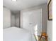 Neutral bedroom with double doors, ceiling fan, and a window that provides natural light at 208 W Amelia Ave # 1, Tampa, FL 33602