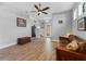 Inviting living room features hardwood floors, ceiling fan, and comfortable seating, perfect for relaxation at 208 W Amelia Ave # 1, Tampa, FL 33602