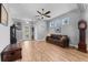 Bright living room showcasing natural light from the decorative windows, and hardwood style flooring at 208 W Amelia Ave # 1, Tampa, FL 33602