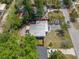 Cozy home with fenced yard, canopy, and patio area, perfect for enjoying outdoor living at 217 Emerald Ln, Largo, FL 33771