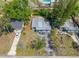 Desirable home with mature landscaping, fenced yard, driveway and convenient parking space at 217 Emerald Ln, Largo, FL 33771