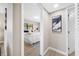 Bedroom entryway showcasing a cozy sleeping space with natural light and comfortable decor at 217 Emerald Ln, Largo, FL 33771