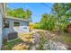Exterior view showing the side of the house and the side yard at 217 Emerald Ln, Largo, FL 33771