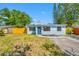 Charming single-story home with a well-maintained front yard and a cozy curb appeal at 217 Emerald Ln, Largo, FL 33771