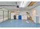 Spacious garage featuring a laundry area and ample storage space at 2222 Mayfield Palms Ln # 322, Sun City Center, FL 33573