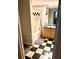 Practical bathroom with black and white checkered tile at 2320 W Azeele St # 317, Tampa, FL 33609
