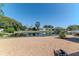 Beautiful waterfront backyard featuring gravel landscaping and scenic water view at 3729 Sail Dr, New Port Richey, FL 34652
