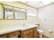 Bathroom with a vanity, white countertops, and a shower/tub combo, providing a clean and functional space at 3729 Sail Dr, New Port Richey, FL 34652