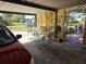 Covered parking area with lattice detailing, creating a welcoming outdoor living space at 402 8Th Sw St, Ruskin, FL 33570