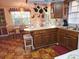 Kitchen with a breakfast nook, white countertops, and updated appliances at 402 8Th Sw St, Ruskin, FL 33570