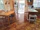 Kitchen with a breakfast nook, white countertops, and wood look flooring at 402 8Th Sw St, Ruskin, FL 33570