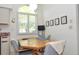 Charming breakfast nook with a table and chairs, perfect for casual dining and enjoying natural light at 4078 Salem Square Pkwy, Palm Harbor, FL 34685