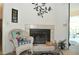 Close-up view of the fireplace, showcasing its tile surround and elegant mantel decorations at 4078 Salem Square Pkwy, Palm Harbor, FL 34685